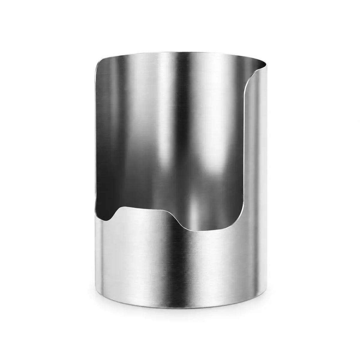 Utensil organizer beside a lid and wooden board
